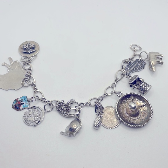 Jewelry - Vintage sterling silver charm bracelet 145 grams
